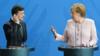 Канцлер Германии Ангела Меркель и новый президент Украины Владимир Зеленский выступают перед СМИ по итогам переговоров в Канцелярии 18 июня 2019 года в Берлине
