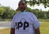 Ренальдо Хадсон в футболке Illinois Prison Project