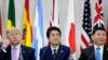 Президент США Дональд Трамп, премьер-министр Японии Синдзо Абэ и президент Китая Си Цзиньпин принимают участие во встрече на саммите G20 в Осаке