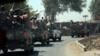 Афганские службы безопасности патрулируют шоссе Гильменд-Кандагар после того, как Талибан предпринял первое крупномасштабное нападение на столицу юго-западной провинции Гильменд в Афганистане