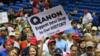 Сторонники Трампа с плакатами QAnon появились на митинге президента Дональда Трампа «Сделаем Америку снова великой» во вторник, 31 июля 2018 г.