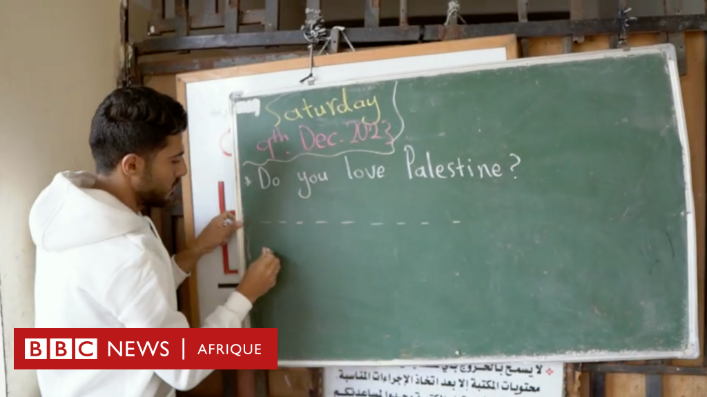 Palestinian teacher Tareq al Enabi volunteers to teach students after his school is bombed