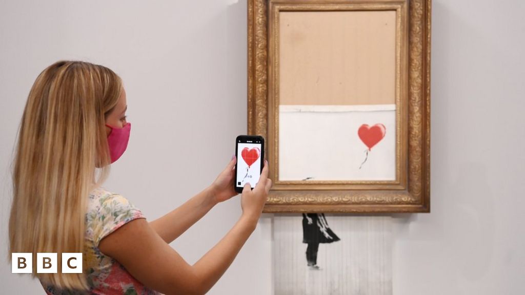 Banksy's half shredded artwork sells for record amount BBC Newsround