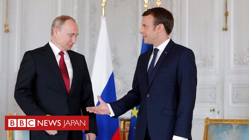 Macron greets Putin at opulent Versailles