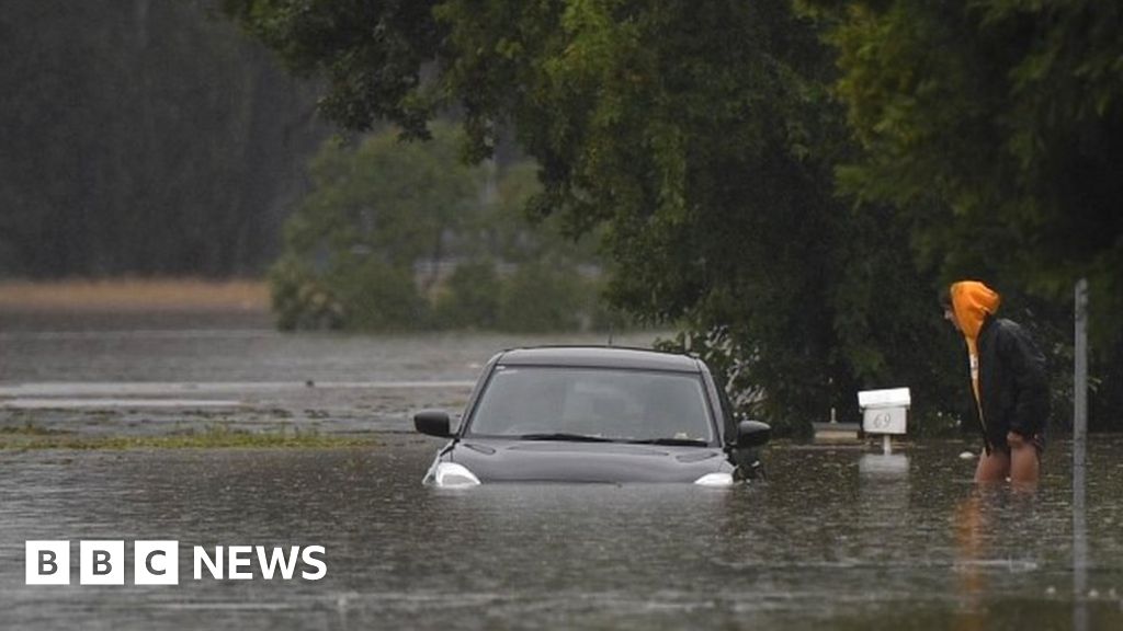 Australia floods: Rainfall set to peak as weather systems collide