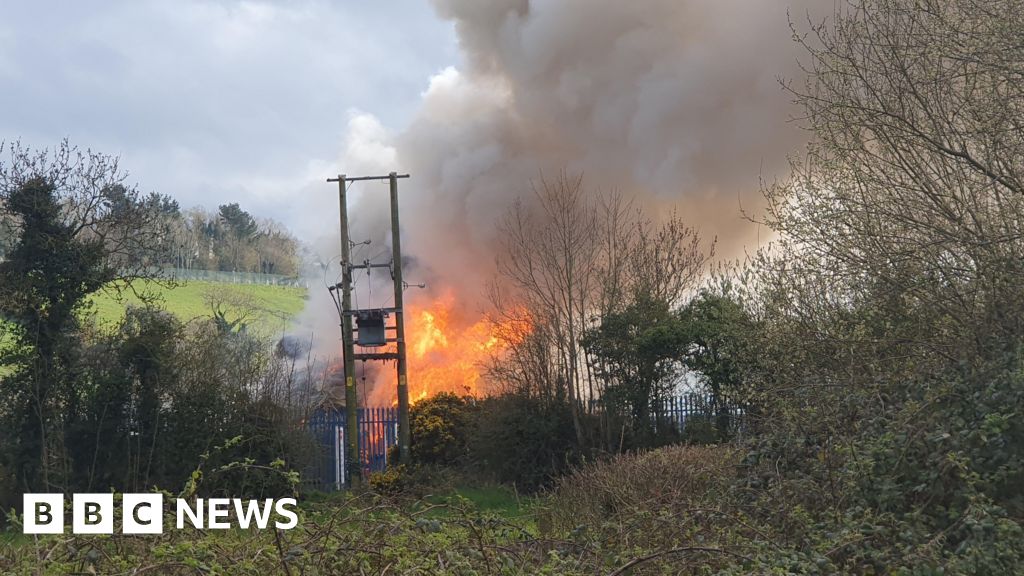 Fire fighters tackle blaze at recycling plant