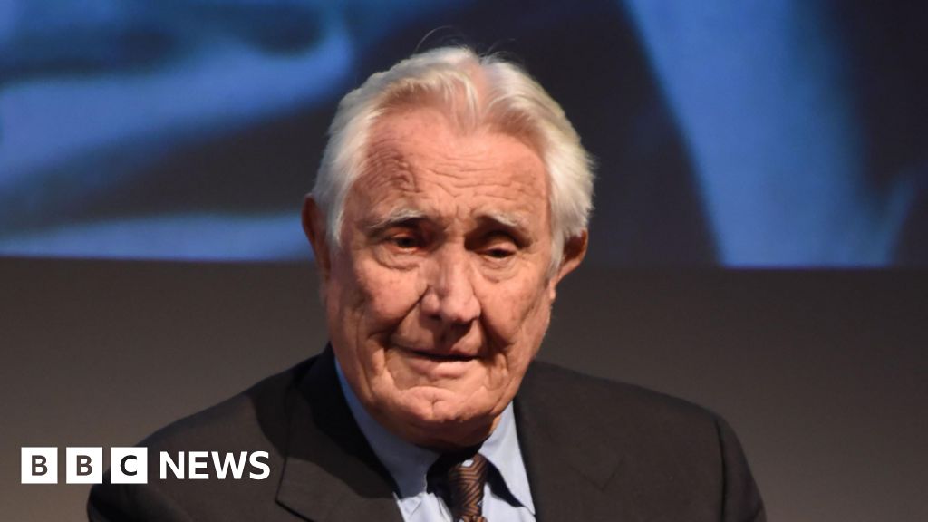 James Bond actor George Lazenby says he's retired