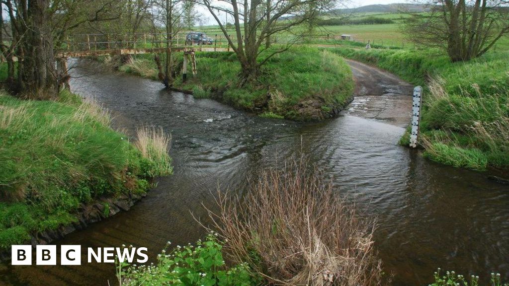 Search for missing man near ford flooded in storm