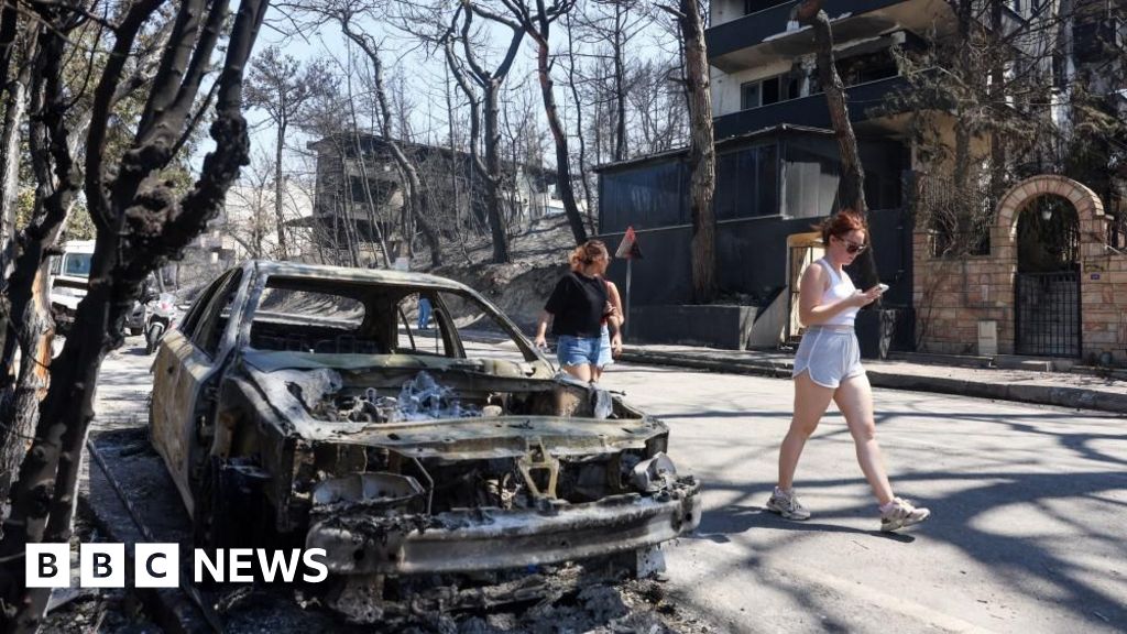Wildfires rage across southern Europe as temperatures top 40C