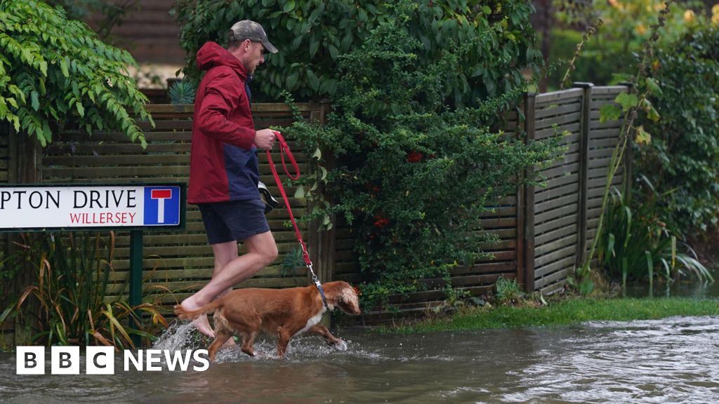 Flash floods and heavy rain batter England and Wales