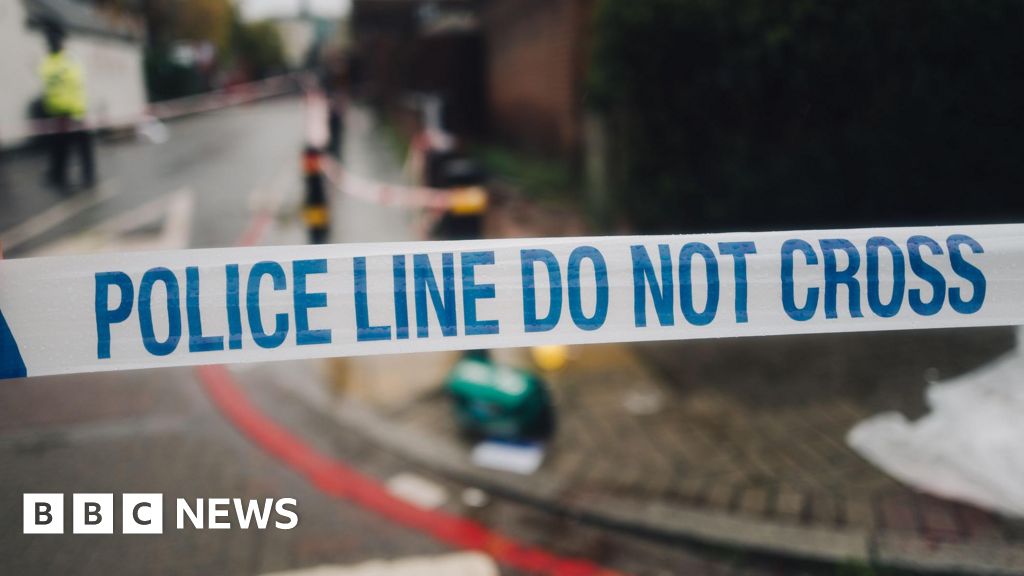 Ashford Surrey: Man arrested after woman dies in property