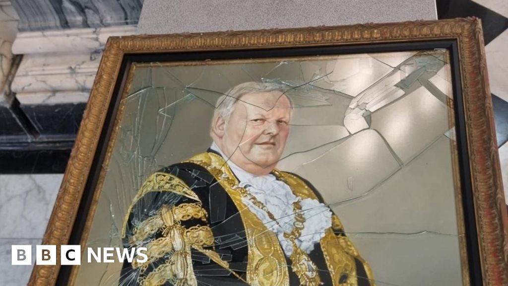 DUP portrait: Photo of damage to painting at centre of Stormont row