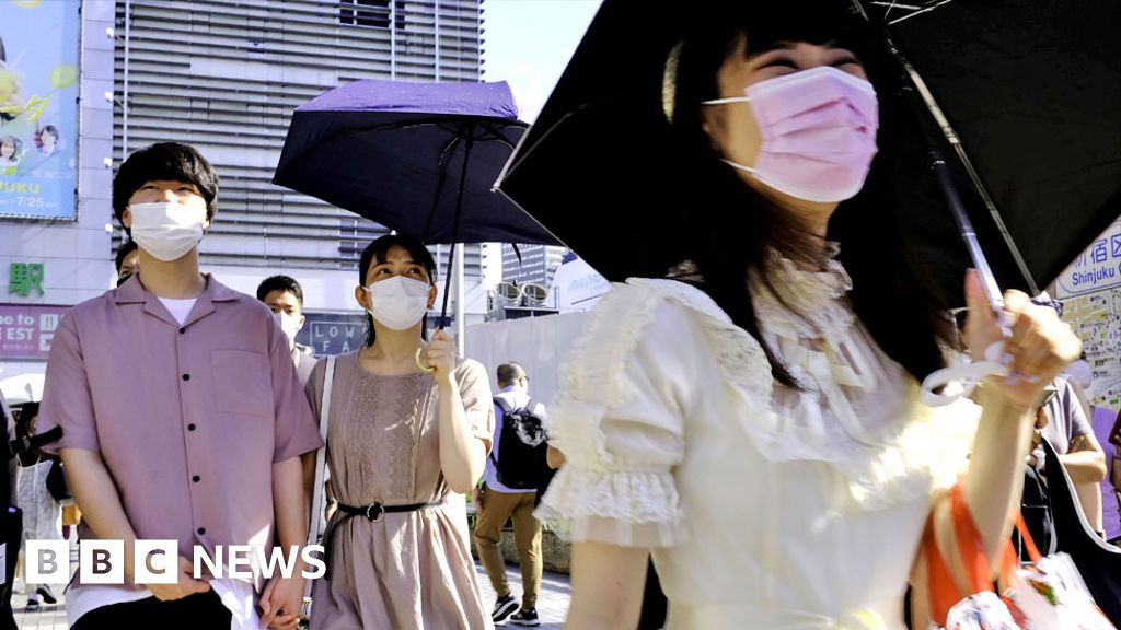 Covid-19 pandemic: Japan widens emergency over 'frightening' spike