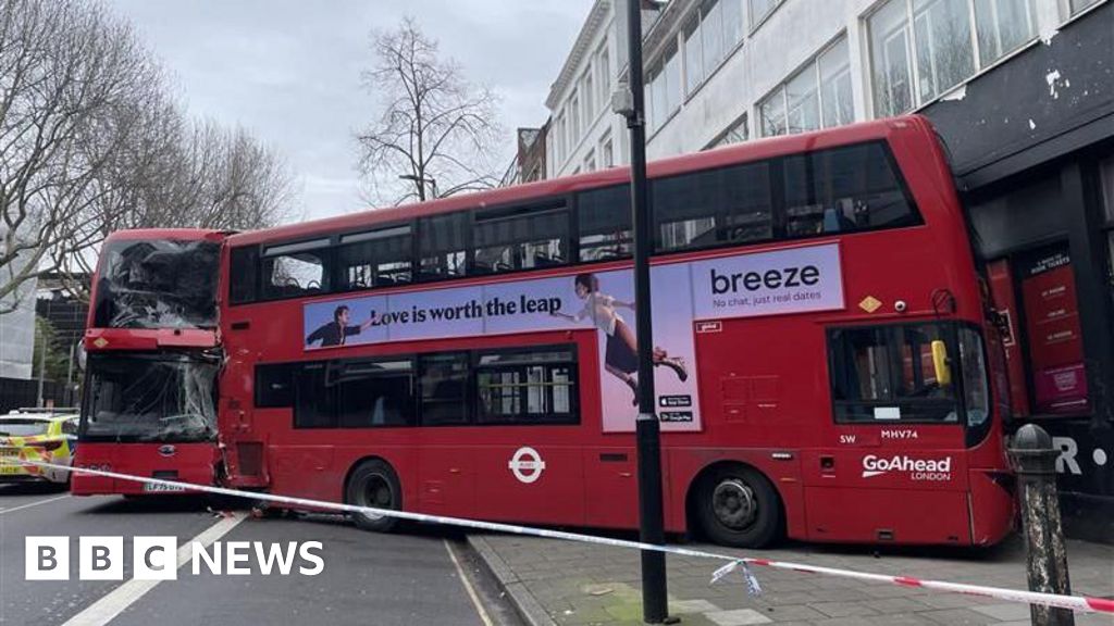 Double decker hits London theatre in two-bus crash