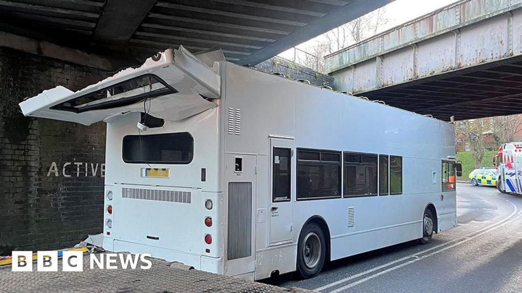 Children hurt as school bus roof ripped off by bridge