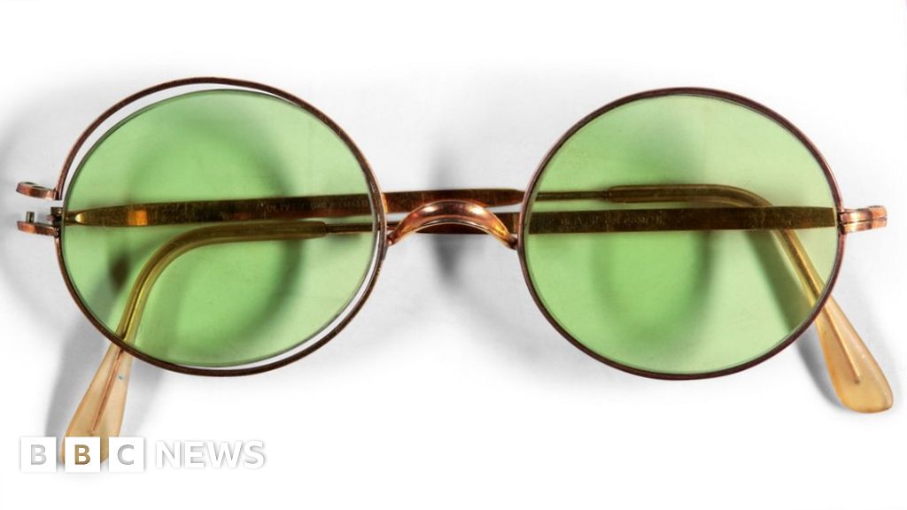 John Lennon's sunglasses sell for £137,000 - BBC News