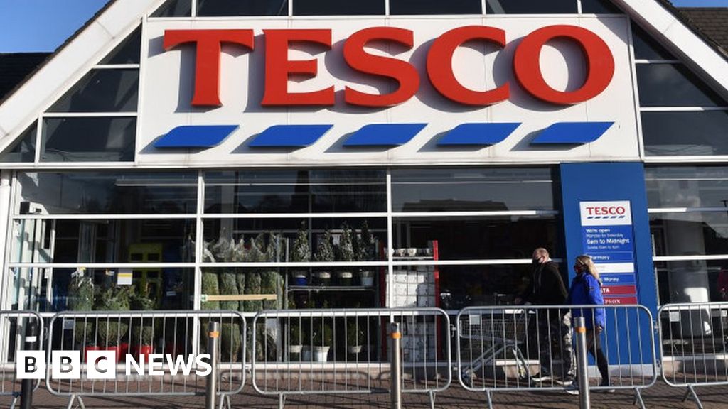 Tesco vows to rein in prices as profits treble