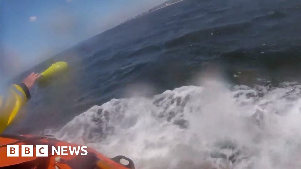 Kinmel Bay: Girl rescued after dinghy drifts out to sea - BBC News