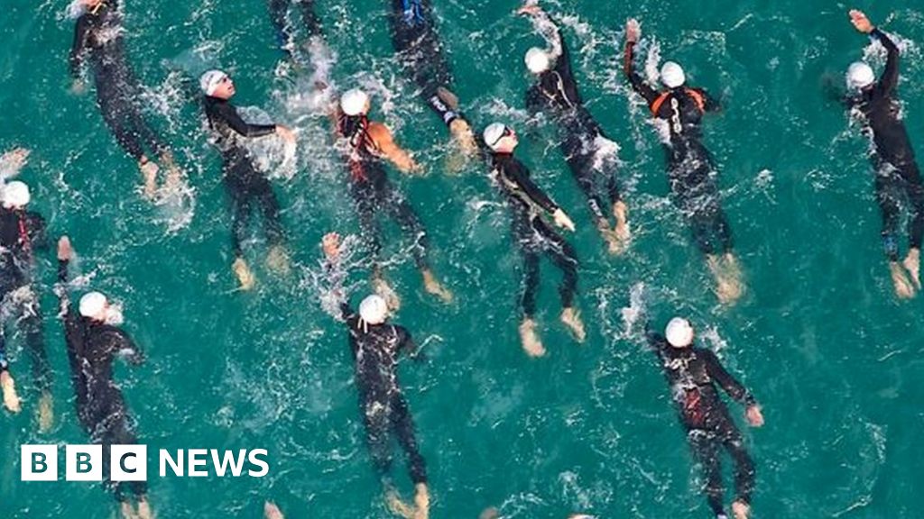 Swansea triathlon: Athlete dies during swimming stage event