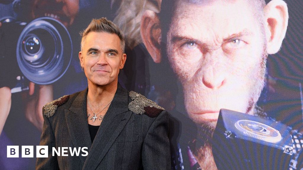 Robbie Williams explains why he’s a monkey in his new movie