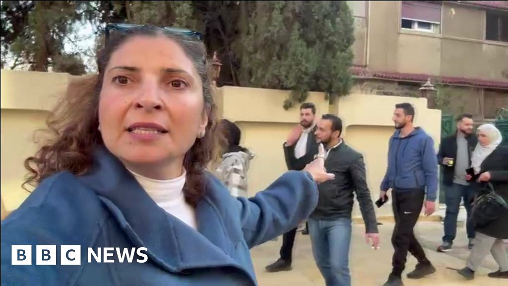 Watch: BBC sees looting at Bashar al-Assad's residence - BBC News
