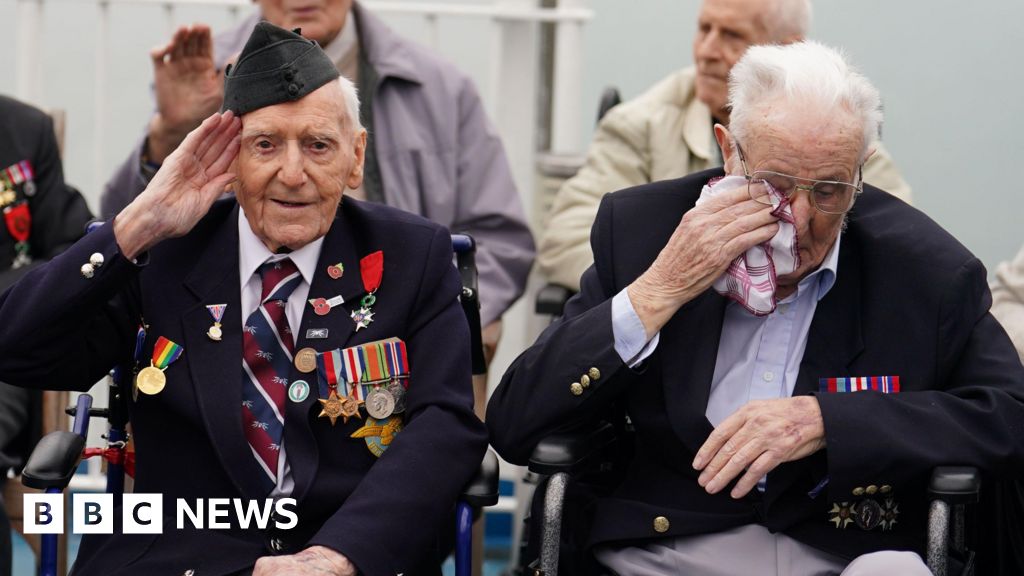 Veterans arriving in France for D-Day anniversary