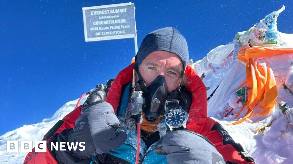 Ex-marine tops Everest after 8,000-mile triathlon