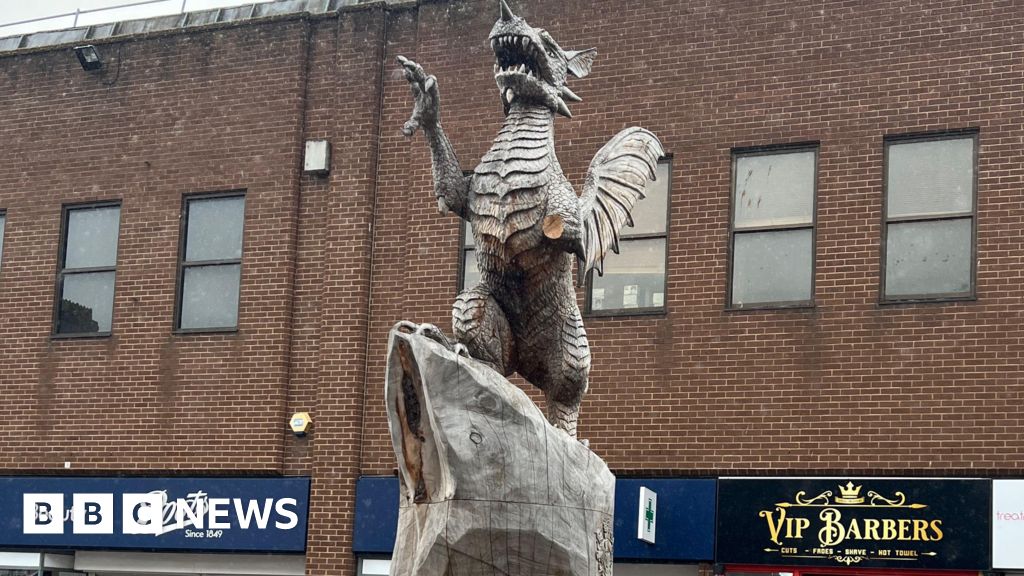 Vandals saw off parts of 'much loved' dragon sculpture