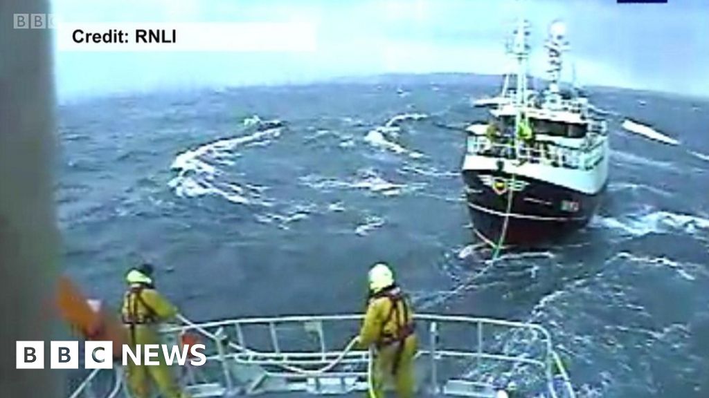 RNLI rescue fishermen in a storm - BBC News