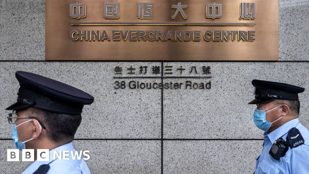 Evergrande: Crisis-hit property giant faces deadline after bosses quit