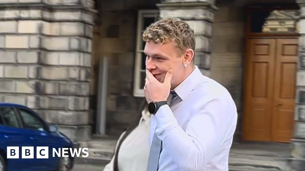 Sean Hogg leaves court after rape conviction quashed - BBC News