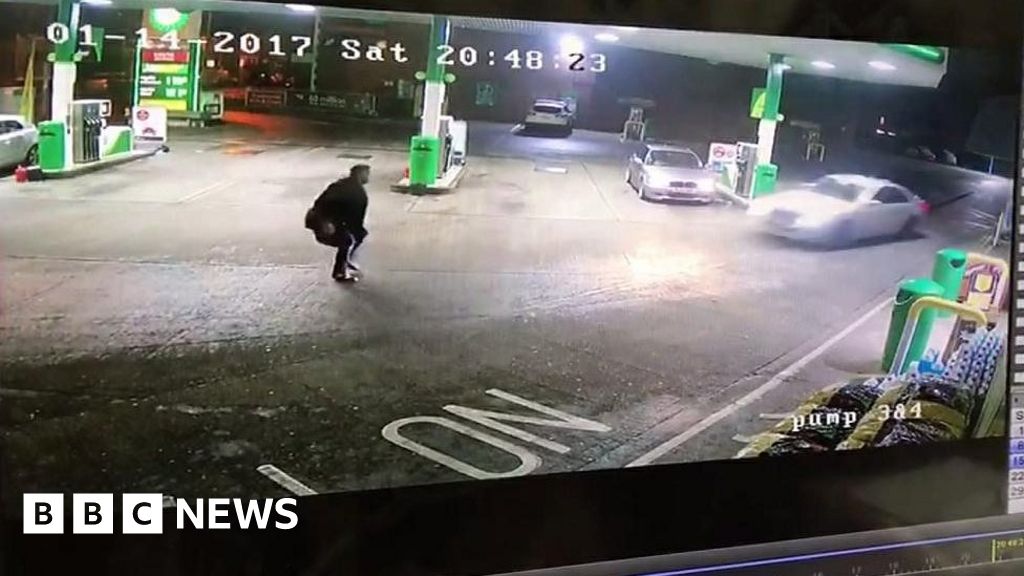 CCTV of a man hit by a car on a petrol station forecourt