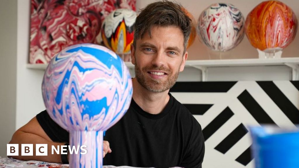 The former footballer scoring with his art