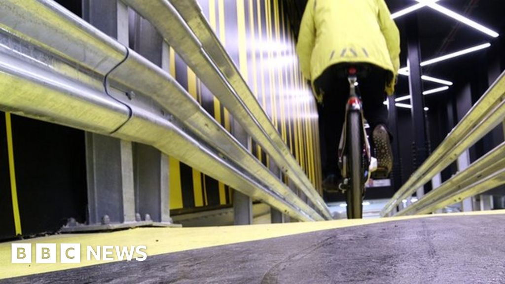 'Cycle-in office' with ramp unveiled - BBC News