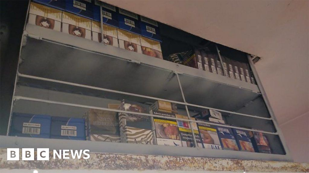 Secret shelf in Boston shop light fitting reveals illegal cigarettes