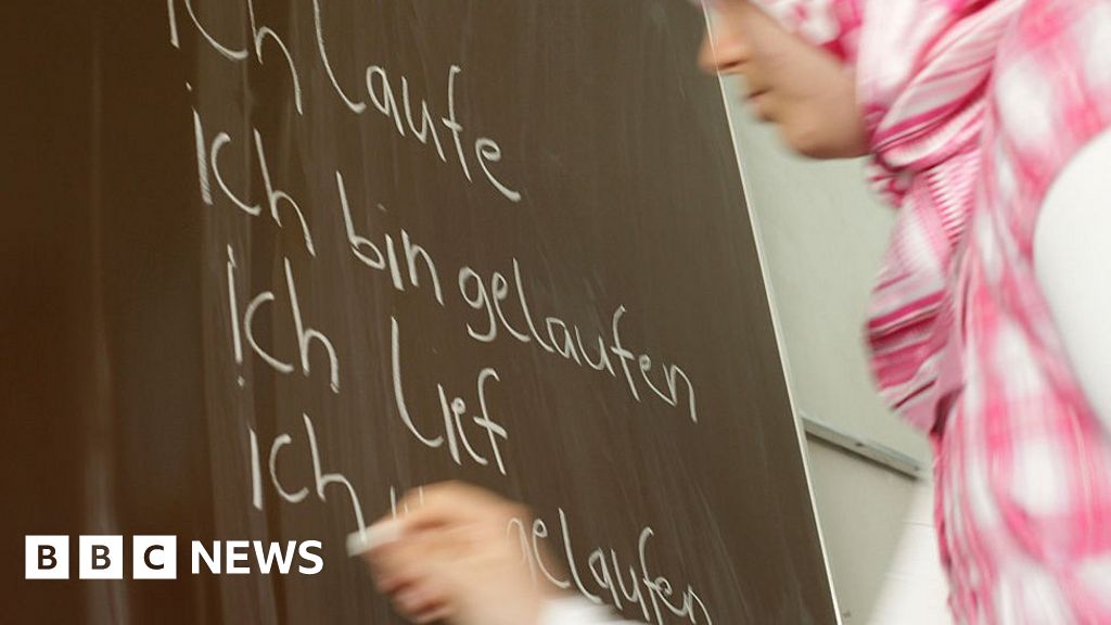 Austria court overturns primary school headscarf ban - BBC News