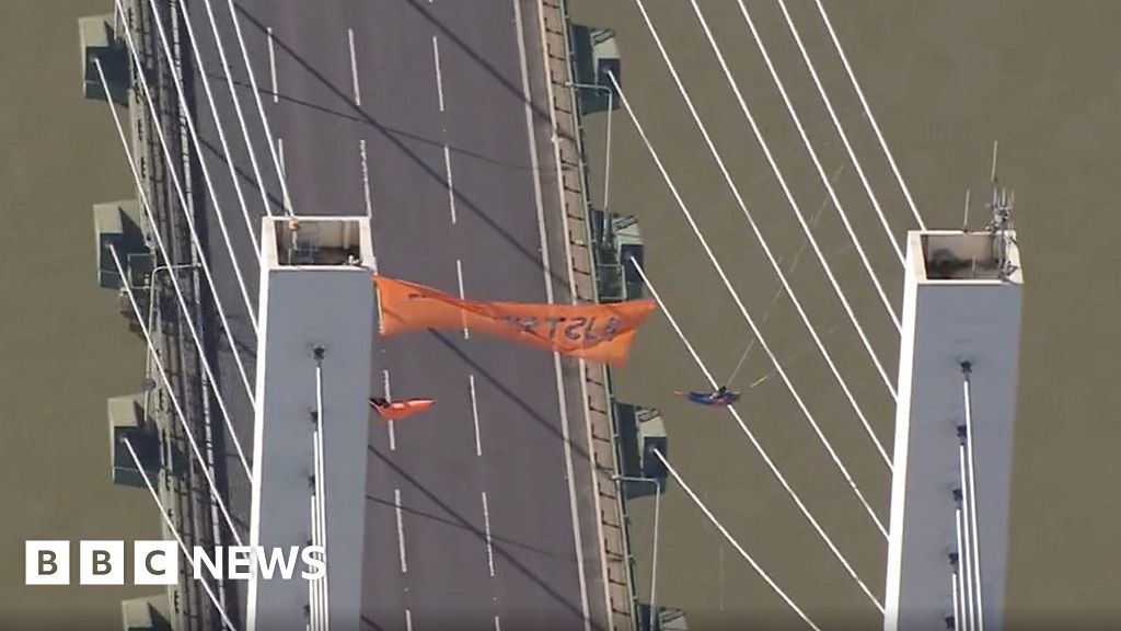 M25 Dartford Crossing Aerial Shots Show Protesters Suspended From Bridge