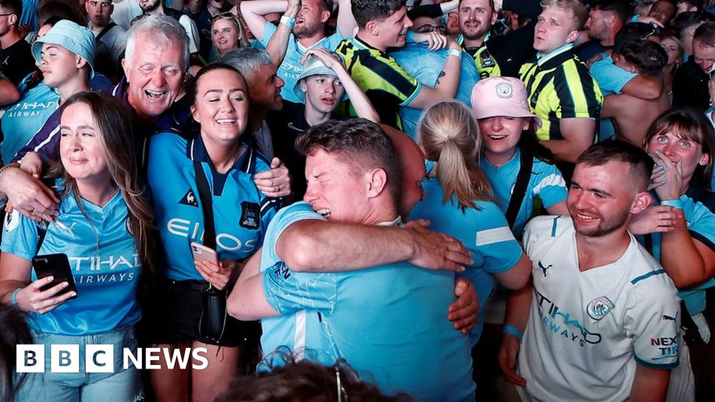 Manchester City fans celebrate historic Treble win