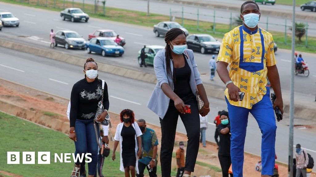 Nigerians cautious as coronavirus lockdown eased - BBC News