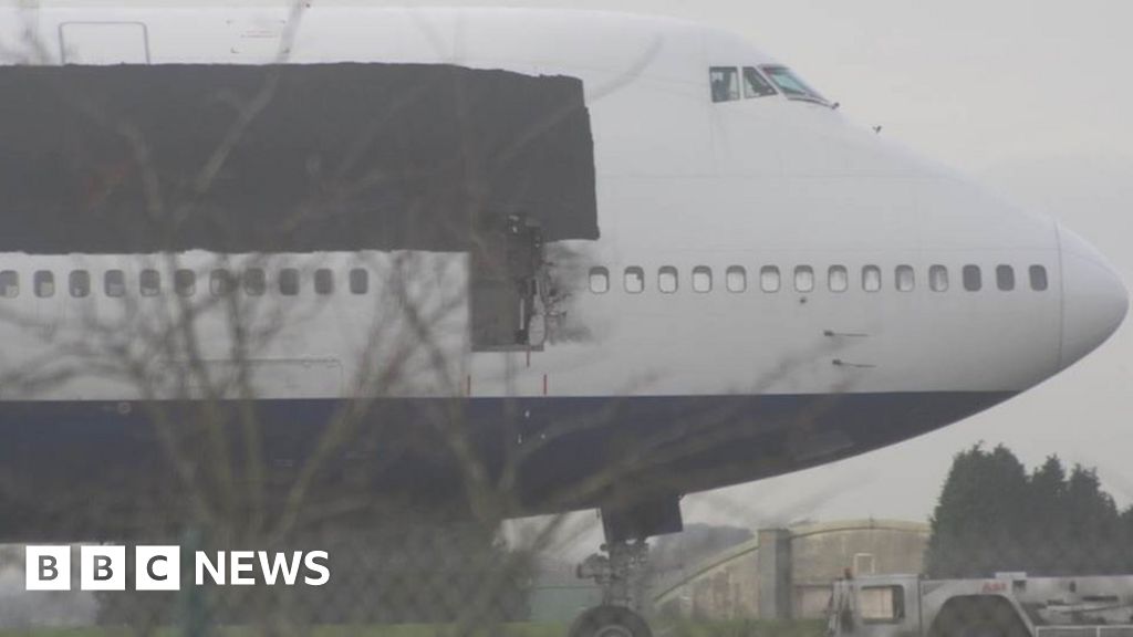 Cotswold Airport 'booms' Plane seen with damaged door BBC News