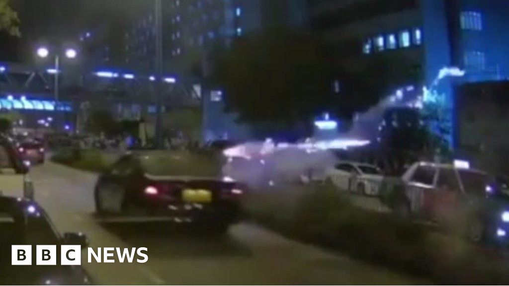 Hong Kong protests: Fireworks launched outside police station