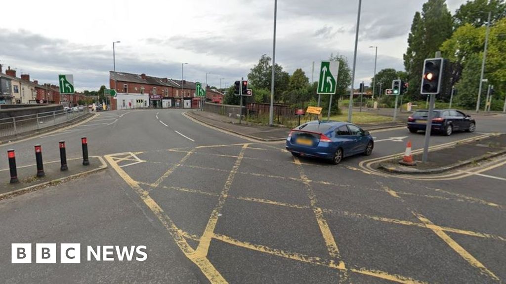 Gorton crash: Man arrested after cyclist, 56, killed - BBC News