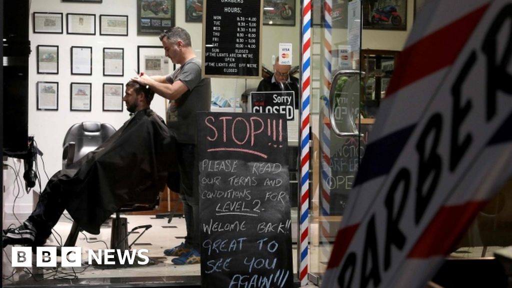 New Zealand reopens with midnight barbers queues