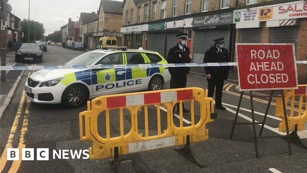 Liverpool shooting: Woman shot by police in street