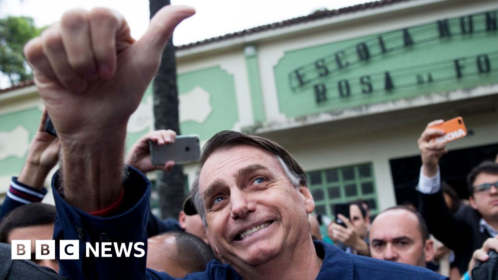 Jair Bolsonaro: Far-right candidate wins first round of Brazil election