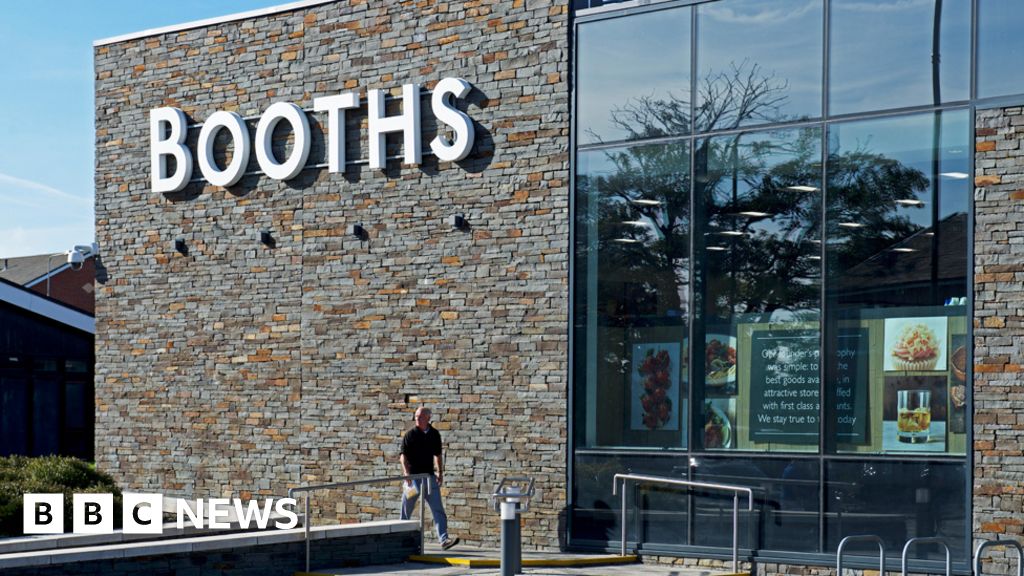 Self-service: Booths supermarket puts staff back behind its tills - BBC News