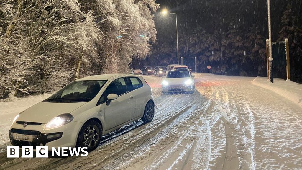 UK temperatures plunge to -12C as snow disrupts travel