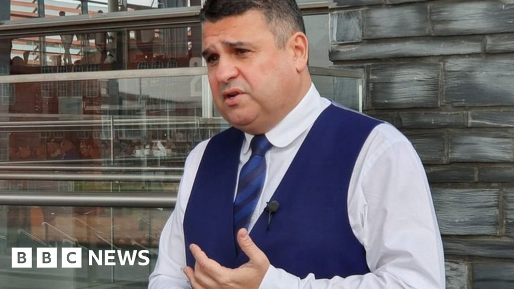 Senedd member Neil McEvoy stages protest during racism ...
