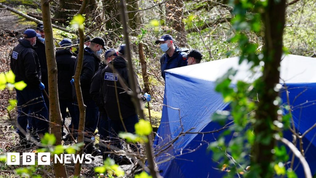 Two men charged with murder over torso find