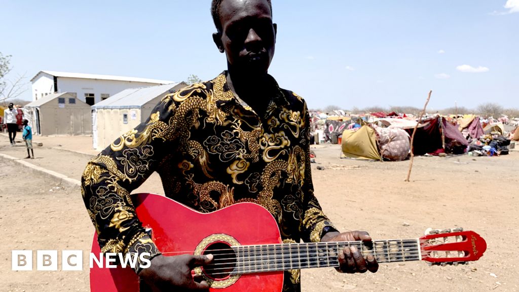 Sudan conflict: 'How I saved my red guitar from Khartoum war zone'